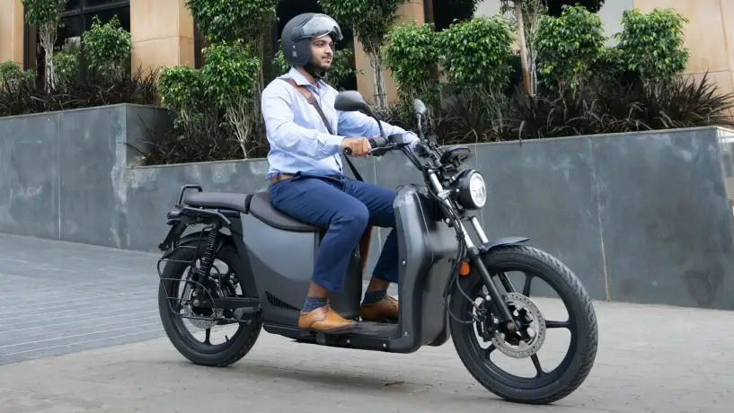 An office goer riding the new electric scooter of Aventose Energy, S110.